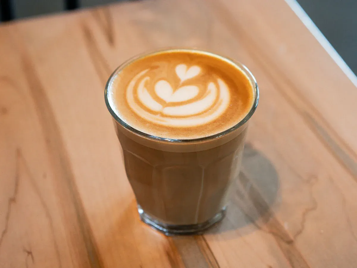 Flat white coffee in a ceramic cup